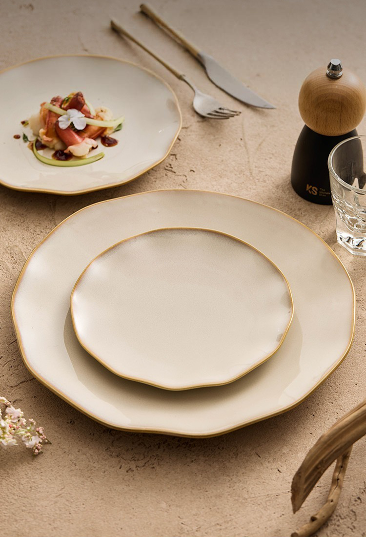 Architectural shallow dish with a smooth matte finish designed to elevate vibrant food colors.