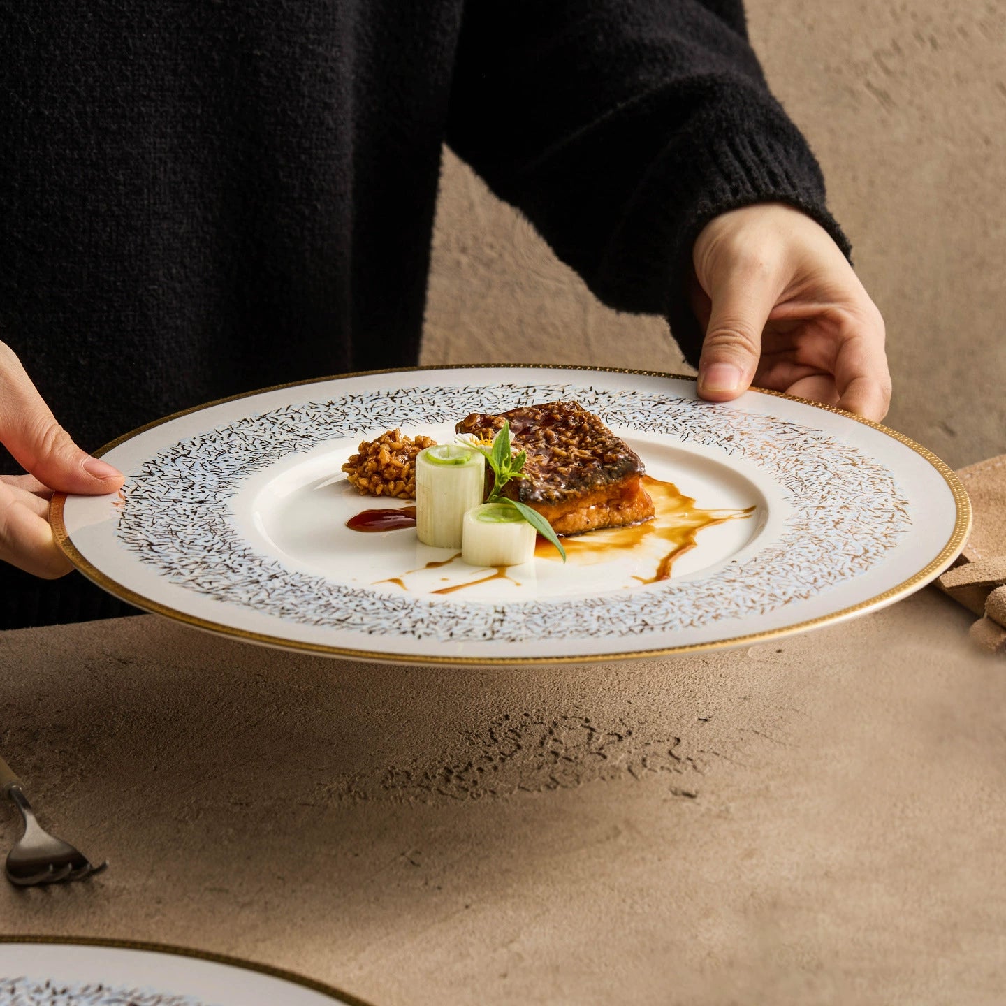 Artisan-crafted porcelain plate with elegant rim design