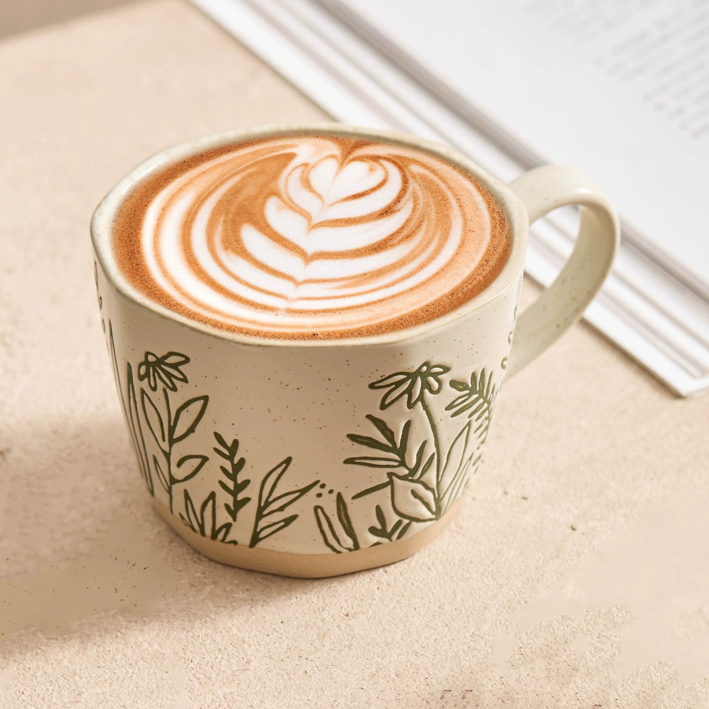 Artisan-crafted stoneware coffee mug with organic texture