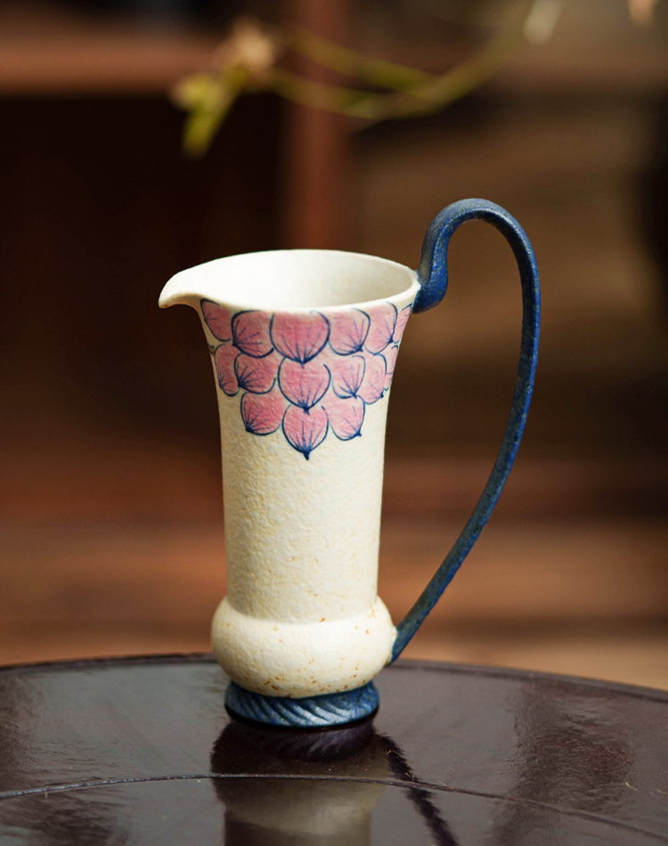 Artistic ceramic milk jug for home or café décor