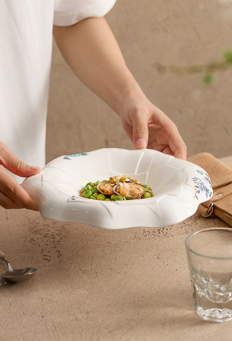 Artistic hand-shaped porcelain for elegant plating and serving.