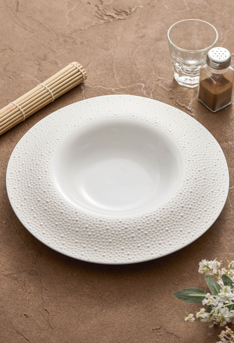 Artistic matte ceramic serving dish