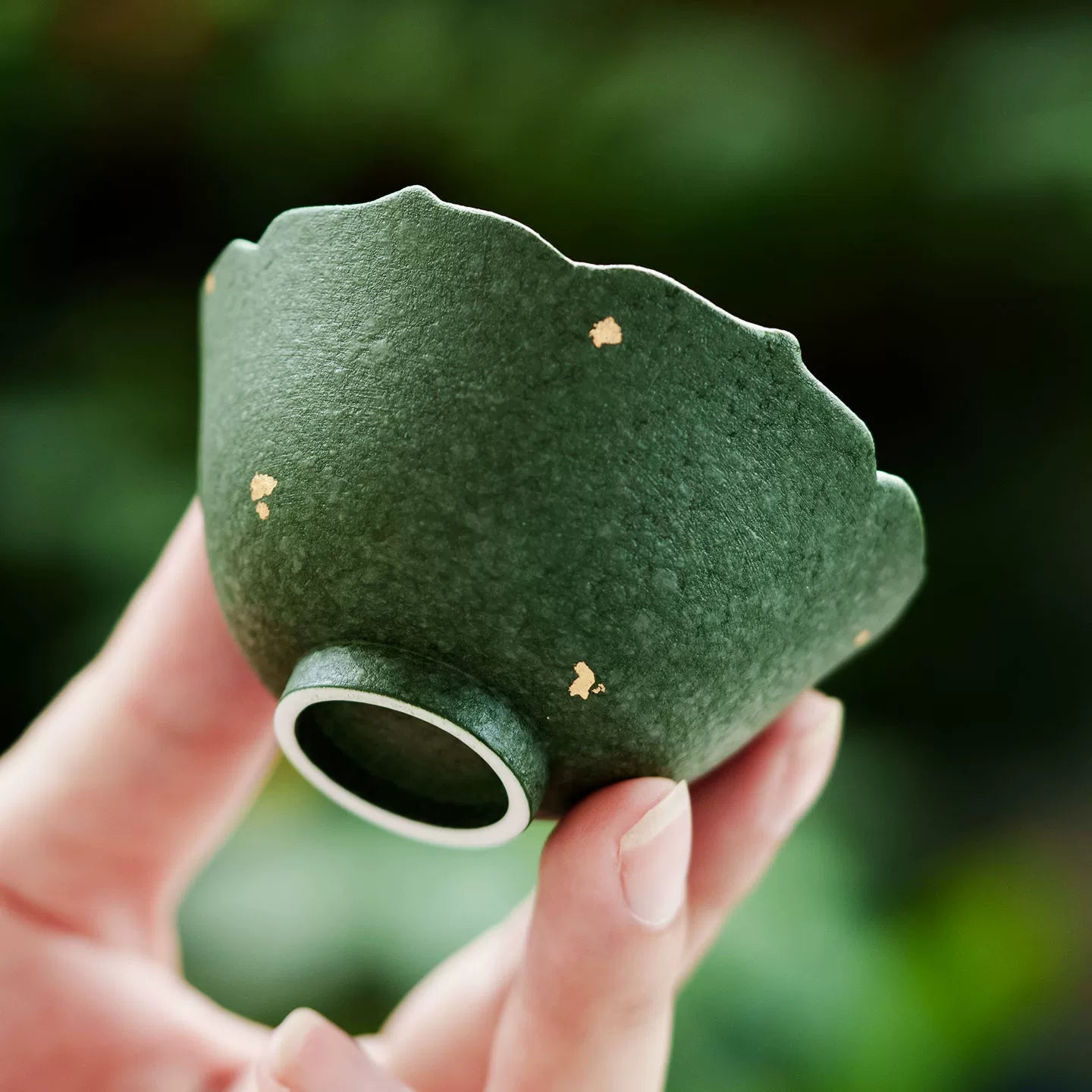 Artistic scalloped edge ceramic tea cup