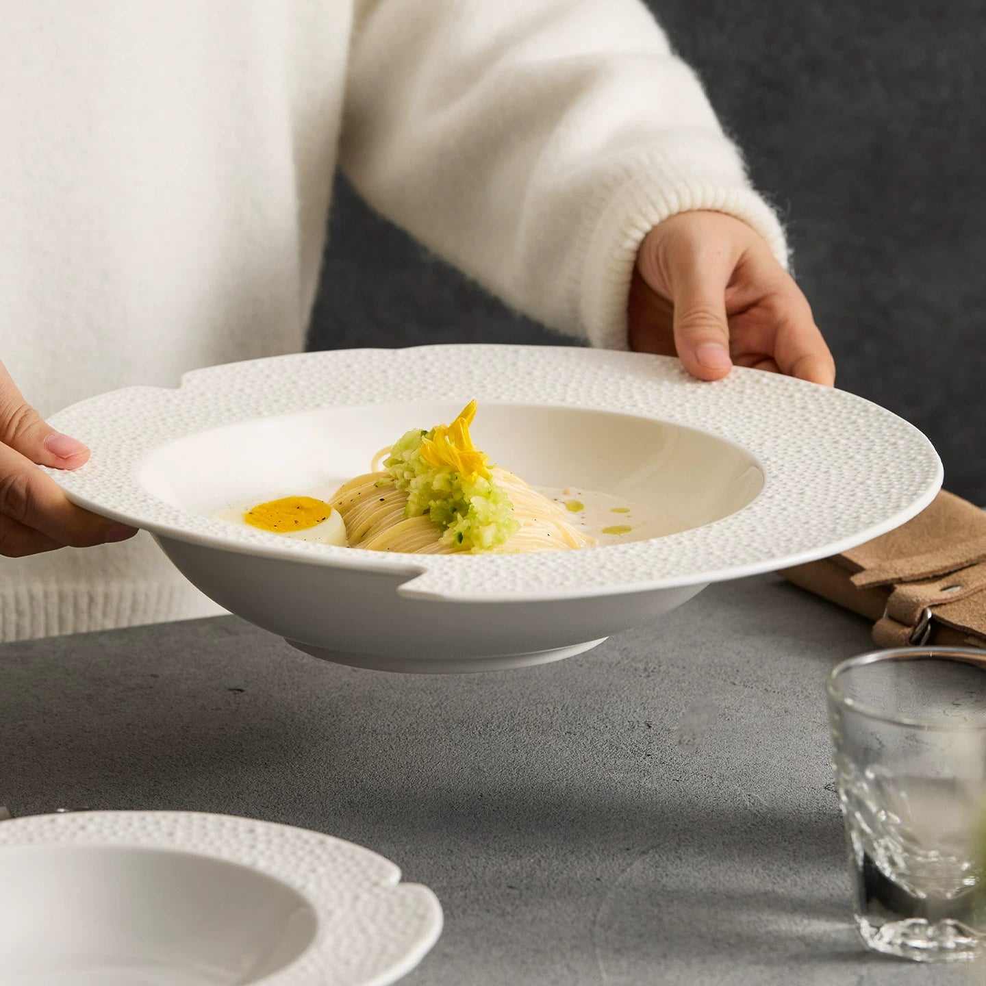Asymmetrical notched rim detail on a GOSEUNG sesame point artisanal bowl.
