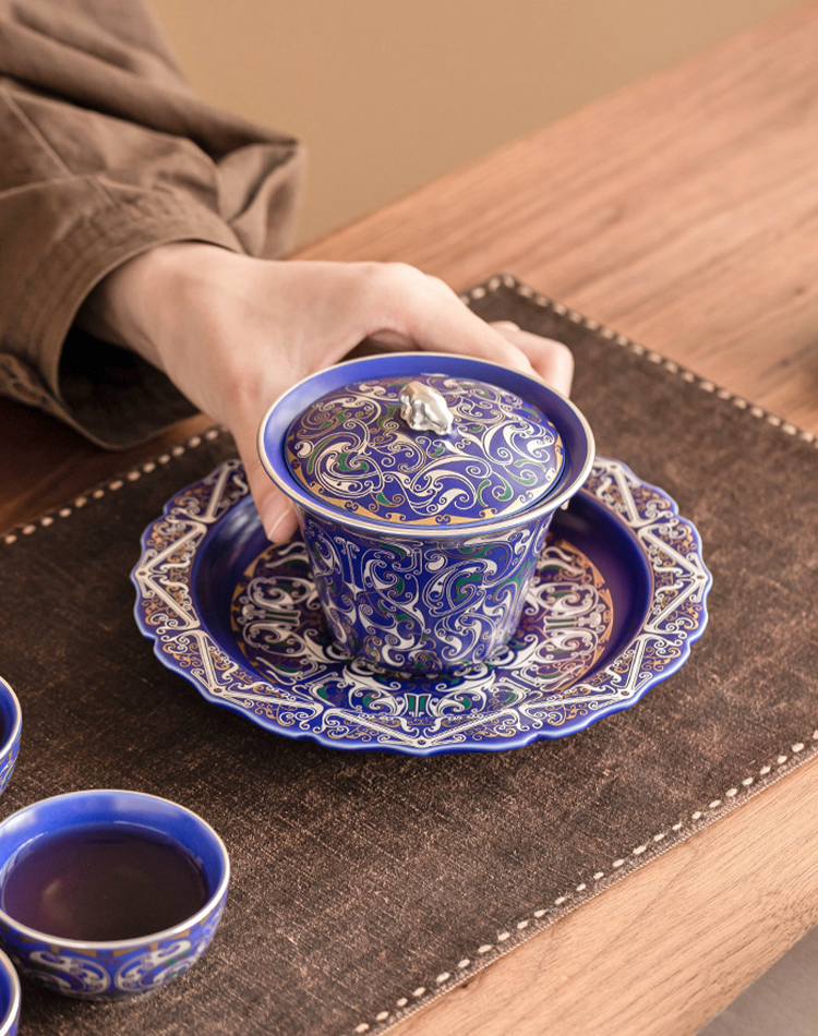 Blue porcelain gaiwan with hand-painted silver dragon motif
