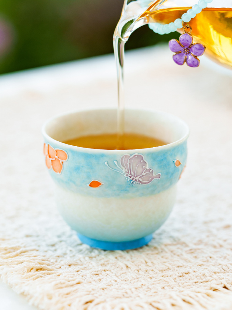 Ceramic blessing tea cup with smooth interior glaze