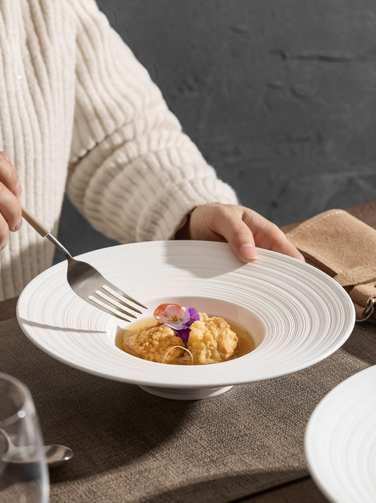 Ceramic plate with recessed center for sauces or entrées
