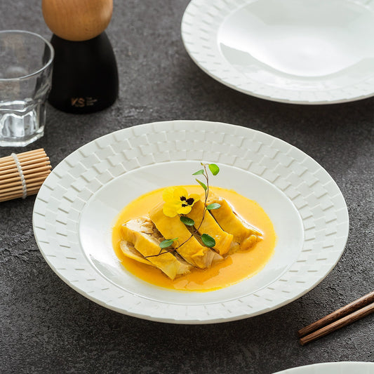 Ceramic shallow plate designed for elegant food presentation