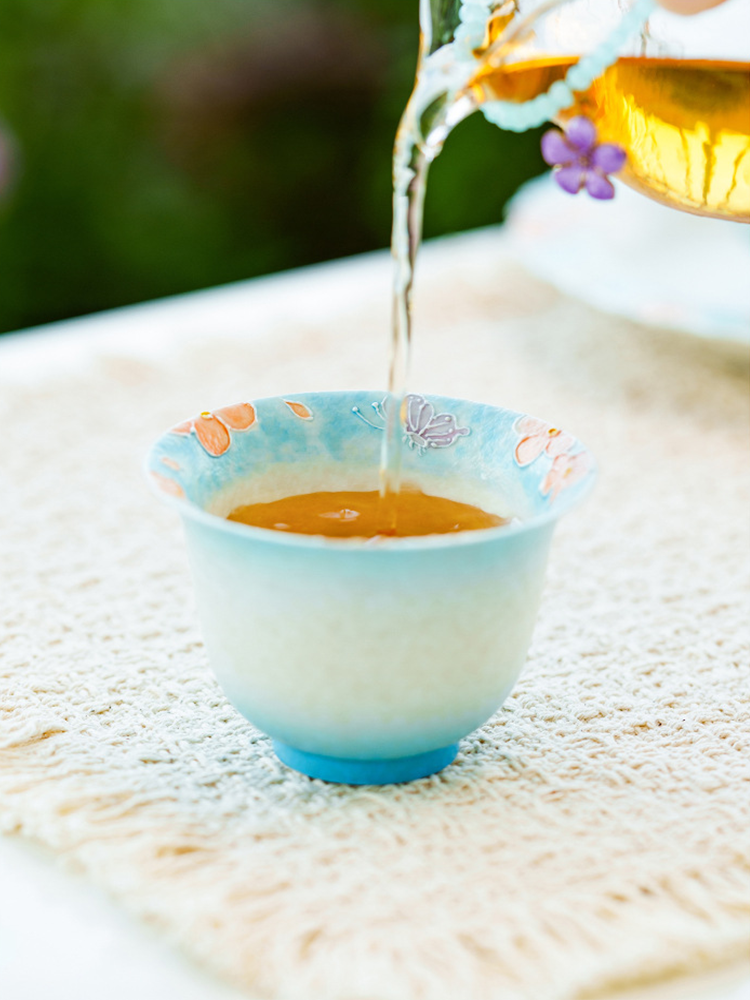 Ceramic tasting cup with outward-curved rim