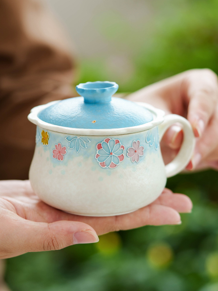 Ceramic tea cup paired with illustrated cultural gift box