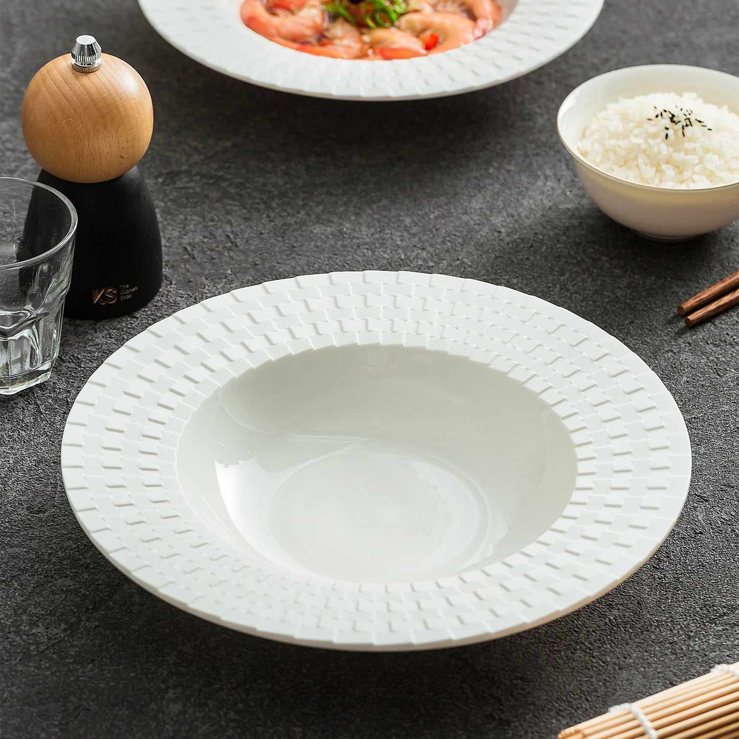 Ceramic wide soup plate designed for modern culinary presentation