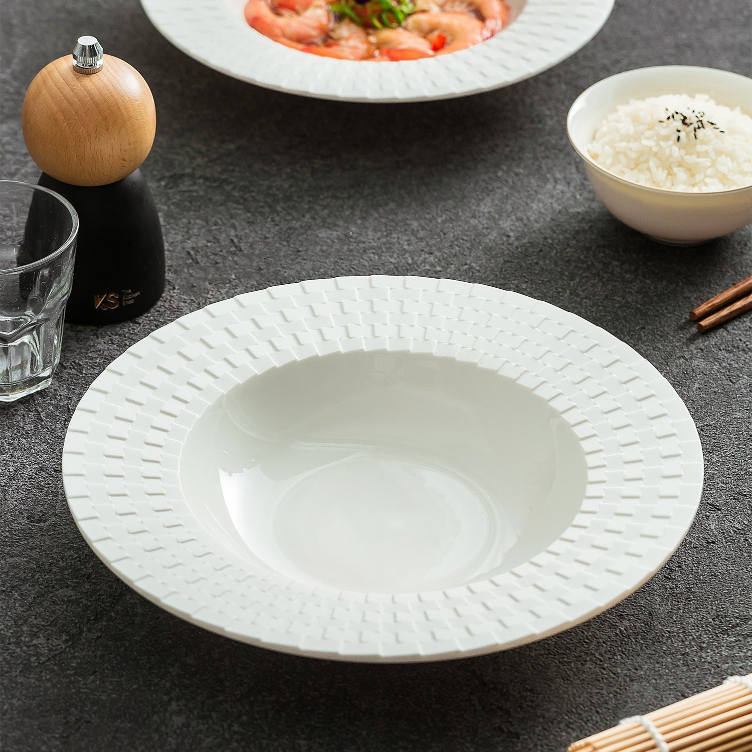 Ceramic wide soup plate designed for modern culinary presentation