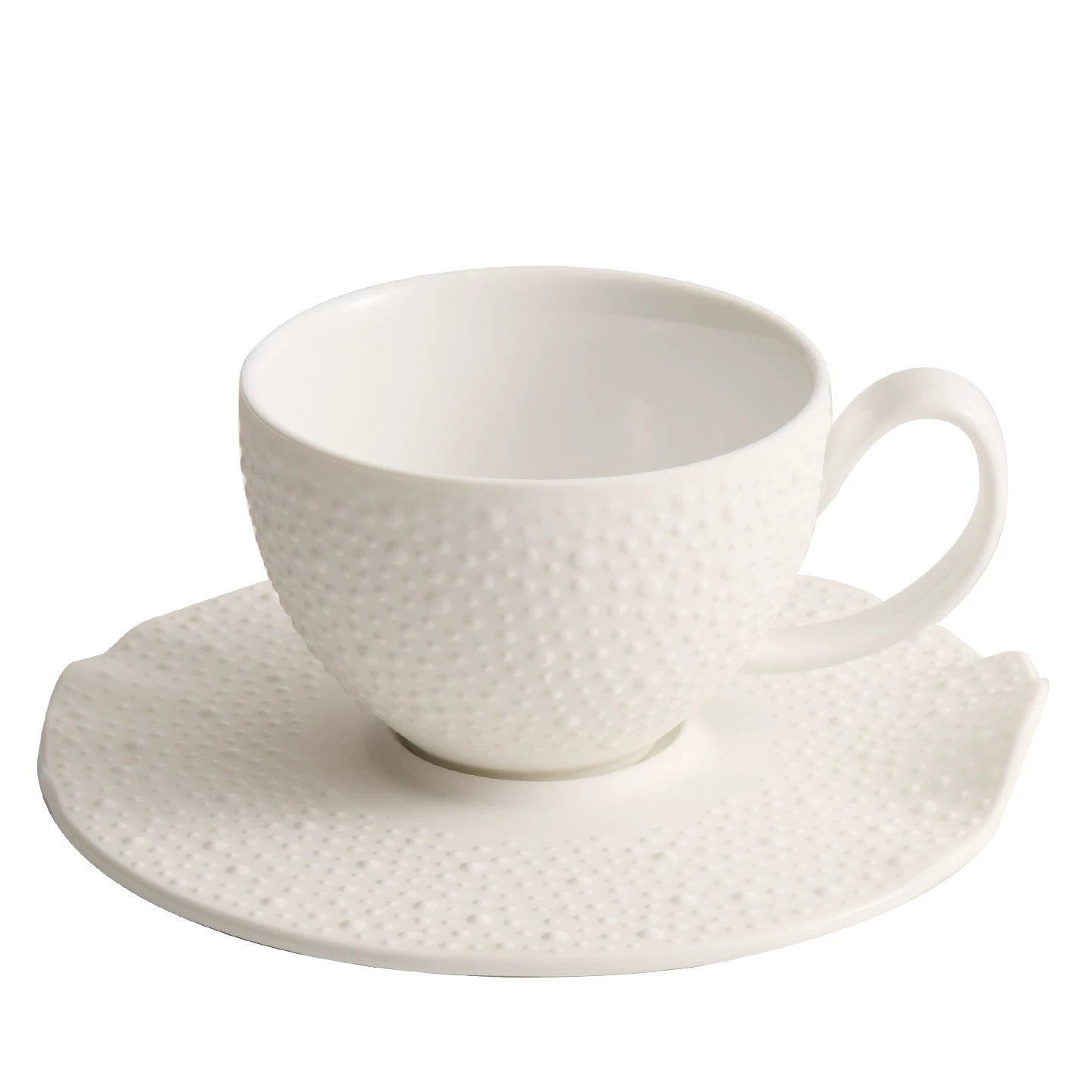 Close-up of sesame point micro-texture on a high-fired ceramic cup.