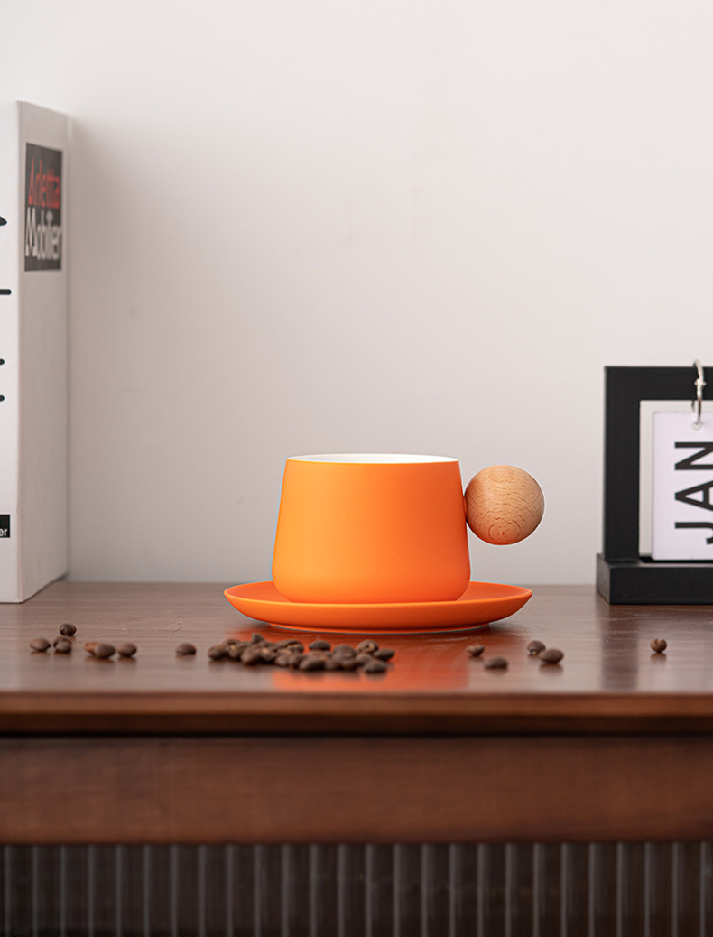 Close-up of wooden ball coffee mug handle

