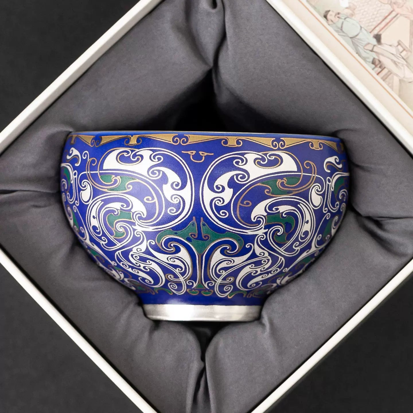 Cobalt blue porcelain cup with ornate 999 silver engraving