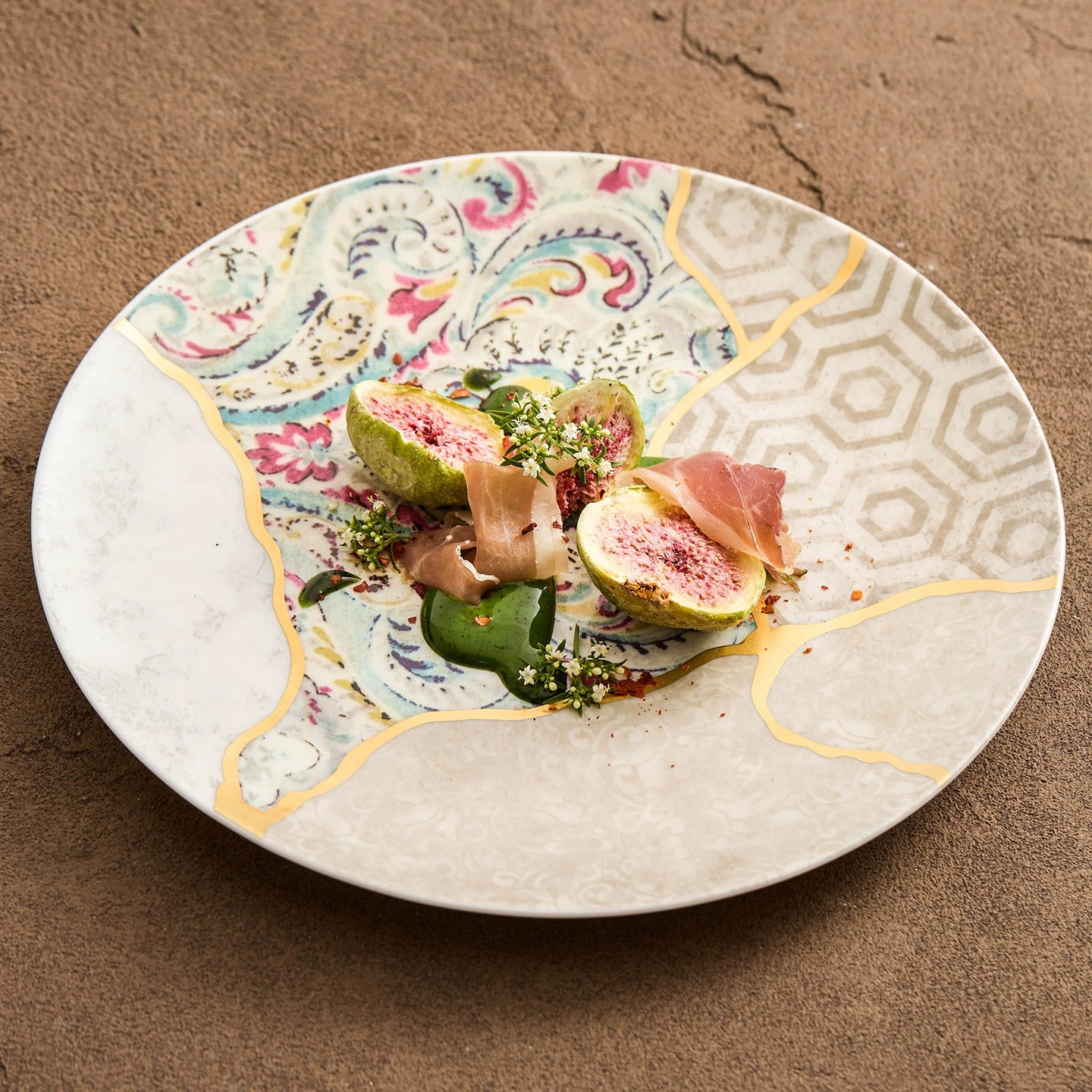 Colorful silk-inspired pattern porcelain plate with gold accents