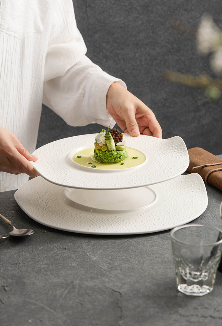 Contemporary white porcelain chef plate