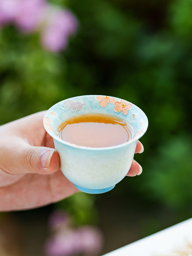 Decorative ceramic tea cup for refined tea rituals