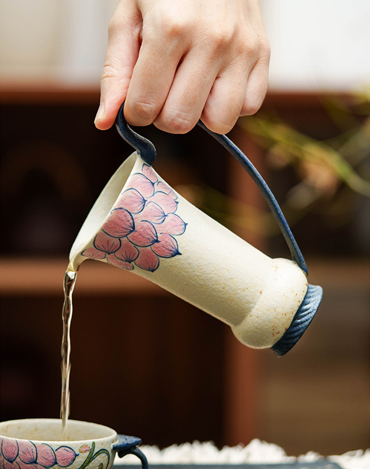 Decorative ceramic vase-style pitcher with floral glaze