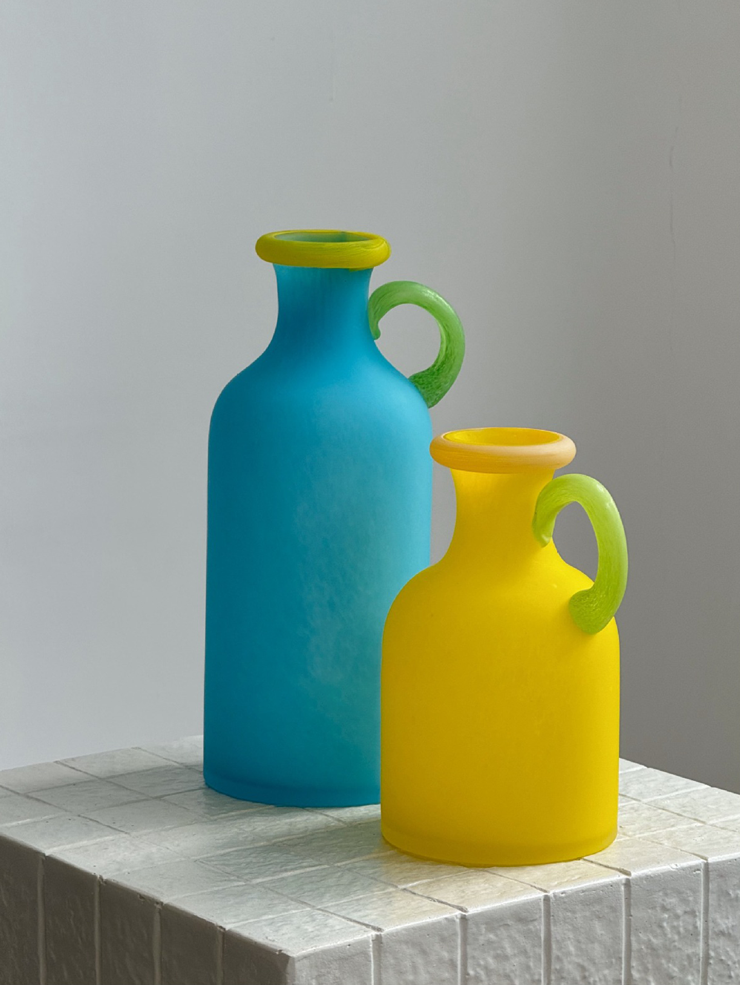 Decorative glass bottle vases with frosted matte finish