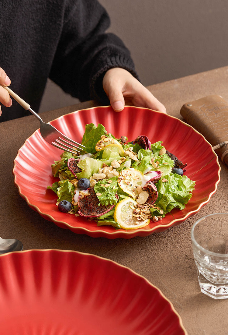 Decorative red ceramic salad bowl for fine dining