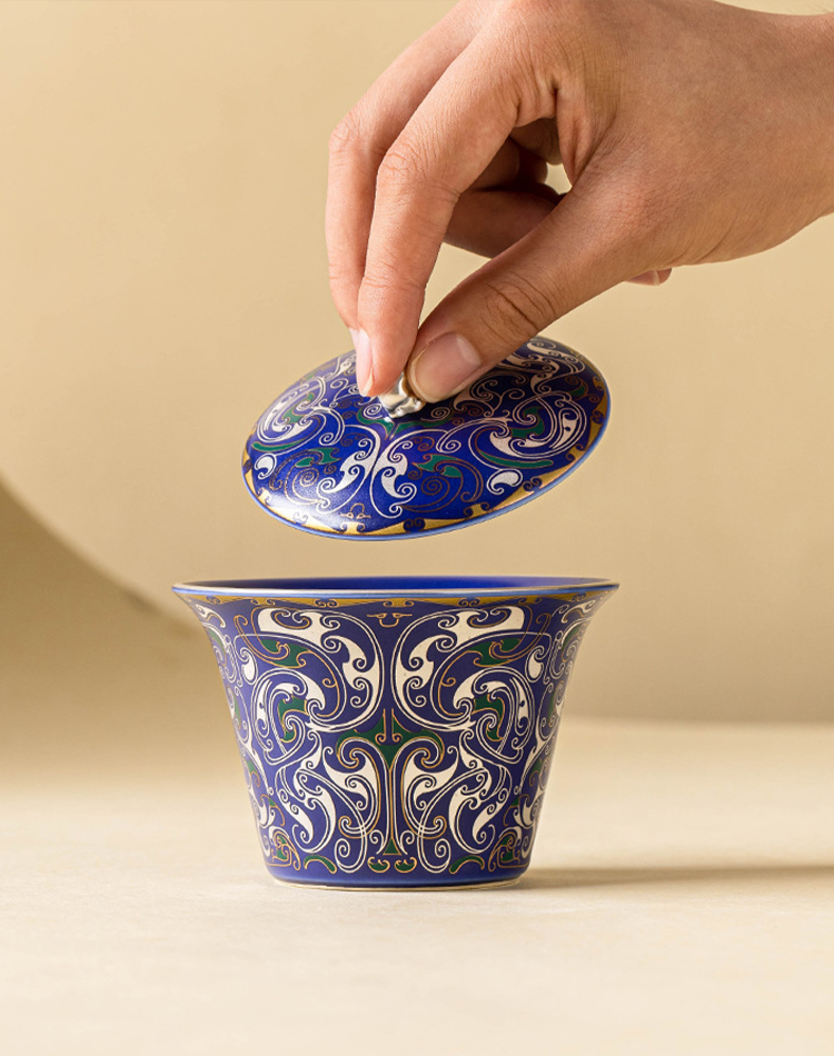 Deep blue porcelain gaiwan with silver floral scrollwork