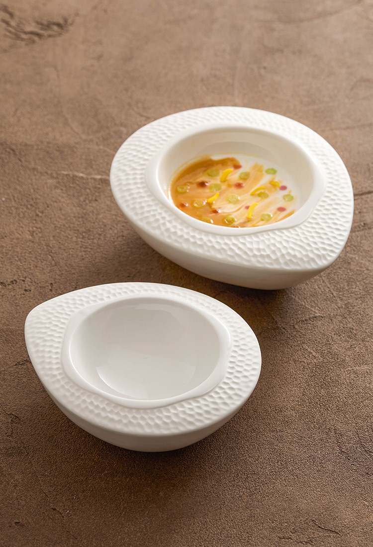 Deep ceramic serving dish with double-layer construction