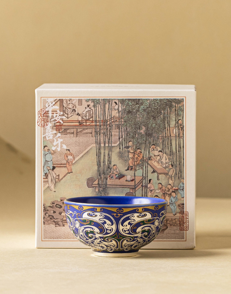 Deep cobalt porcelain tea bowl with silver filigree craftsmanship