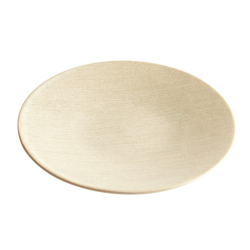 Round beige mat on a white background