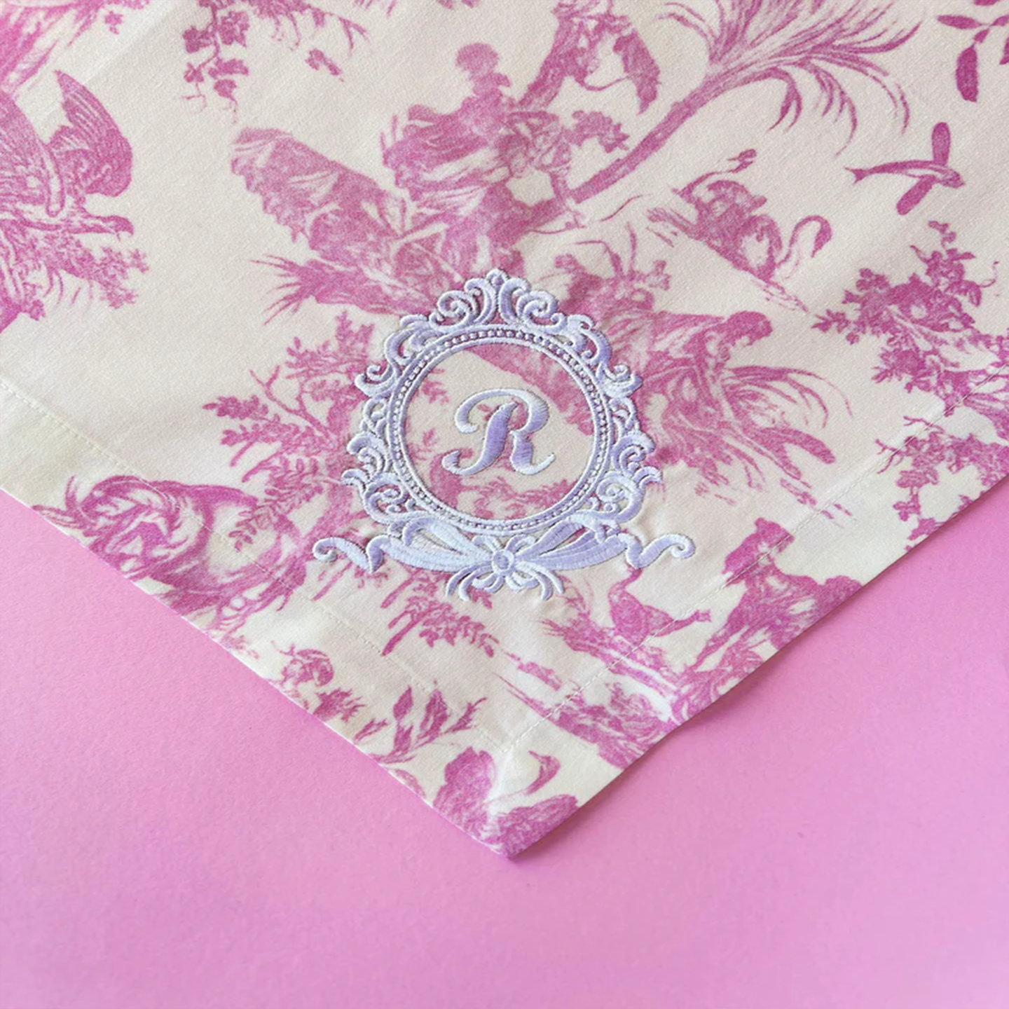 Elegant 18" x 18" pink cotton napkins, perfect for a French country-style dinner party.