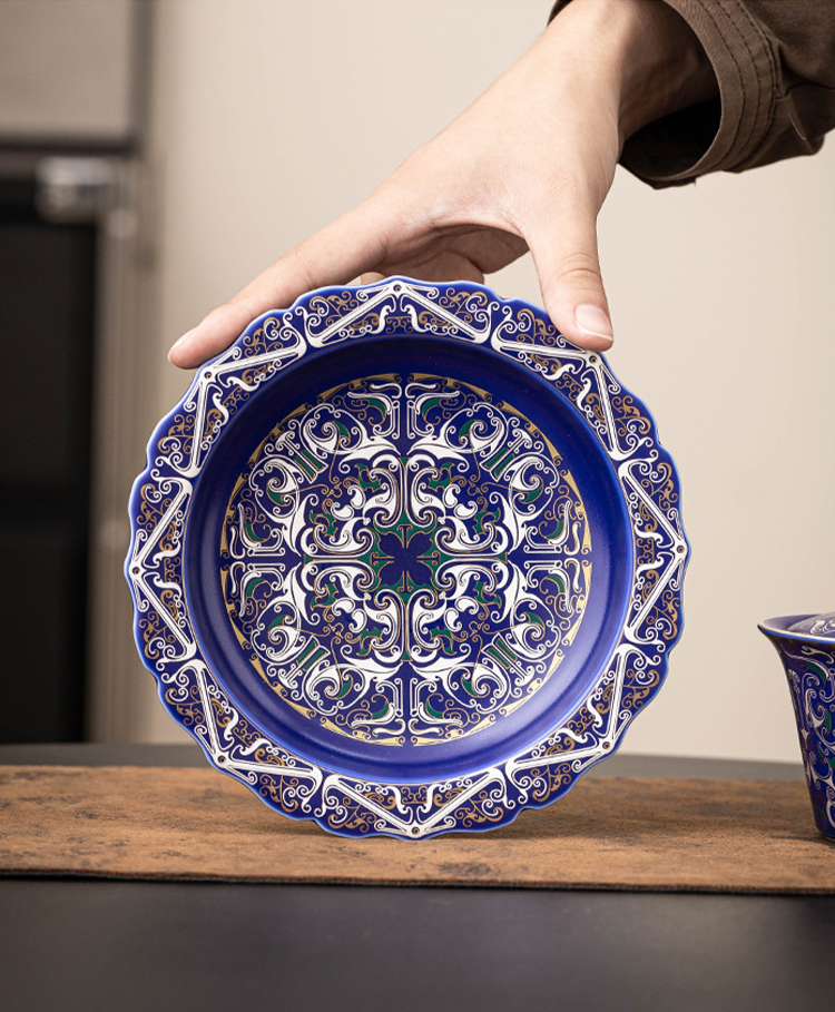 Elegant Chinese saucer with intricate silver filigree craftsmanship