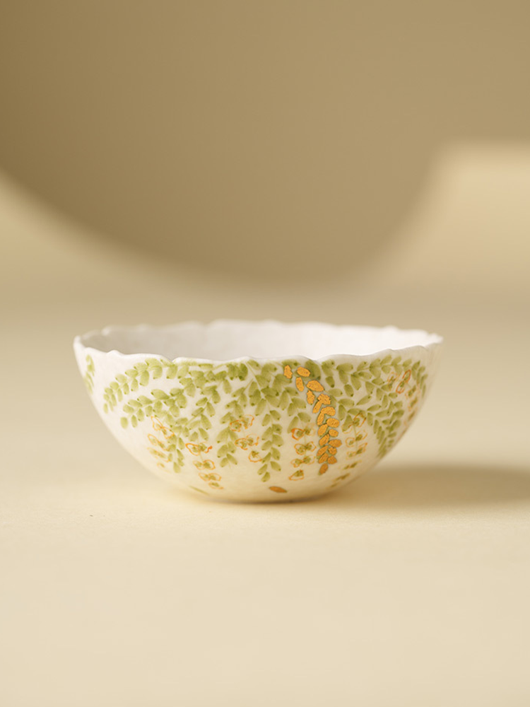 Elegant Chinese tea cup with leaf pattern