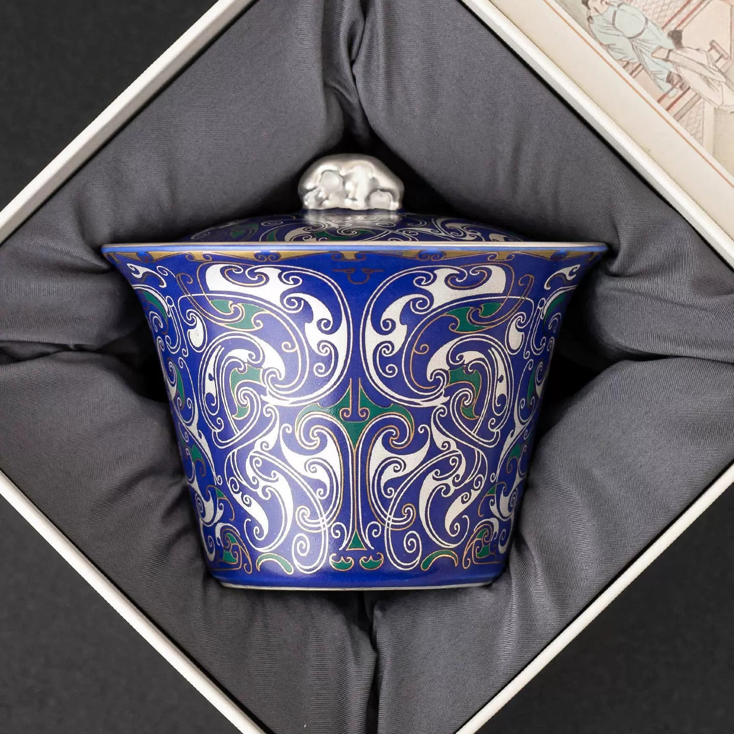 Elegant Chinese tea gaiwan featuring cobalt glaze and silver filigree