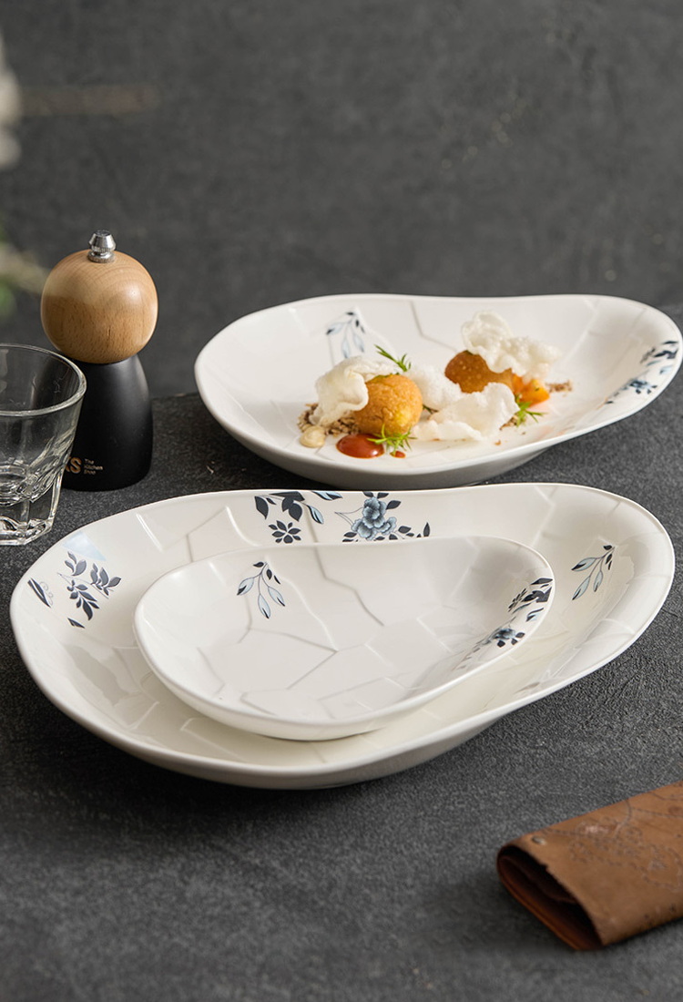 Elegant asymmetric tableware piece for fine dining plating.