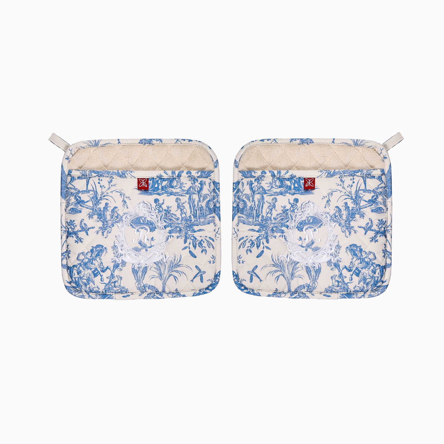 Elegant blue Toile de Jouy cotton pot holder with a detailed pastoral print and quilted texture.