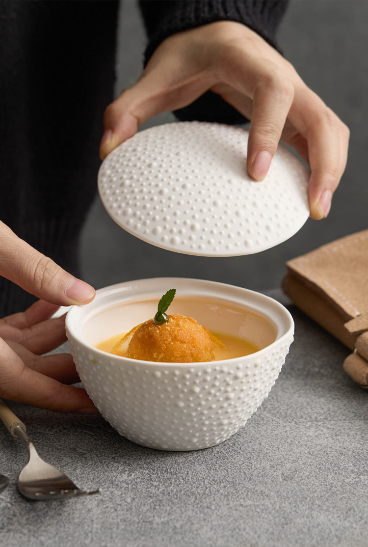 Elegant ceramic serving bowl with lid