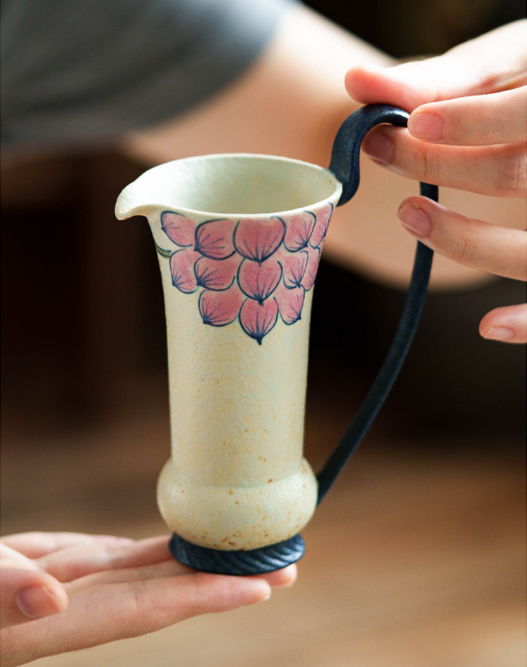Elegant ceramic water pitcher with hand-painted detail