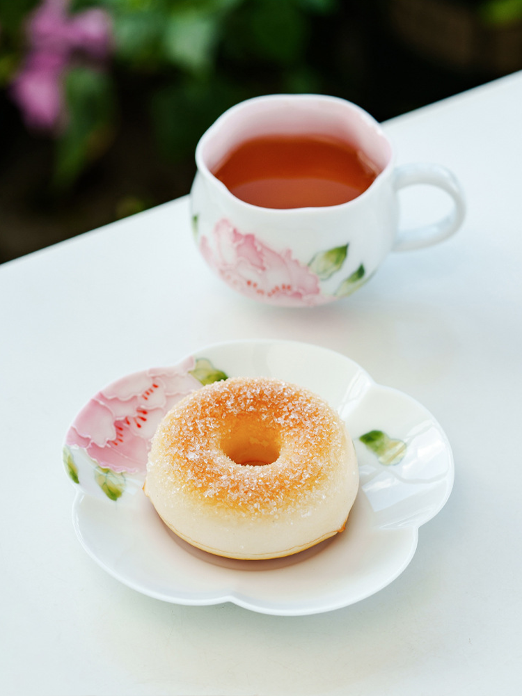 Elegant floral ceramic cup for coffee or black tea