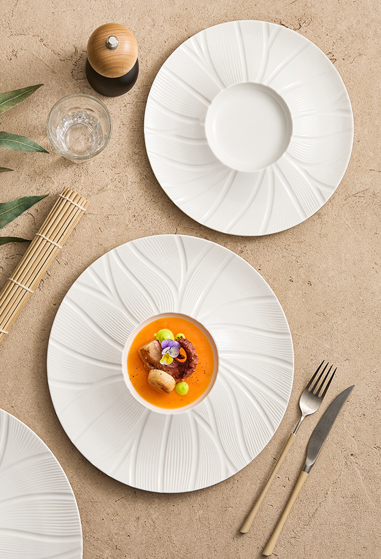 Elegant porcelain plate designed for signature restaurant dishes.