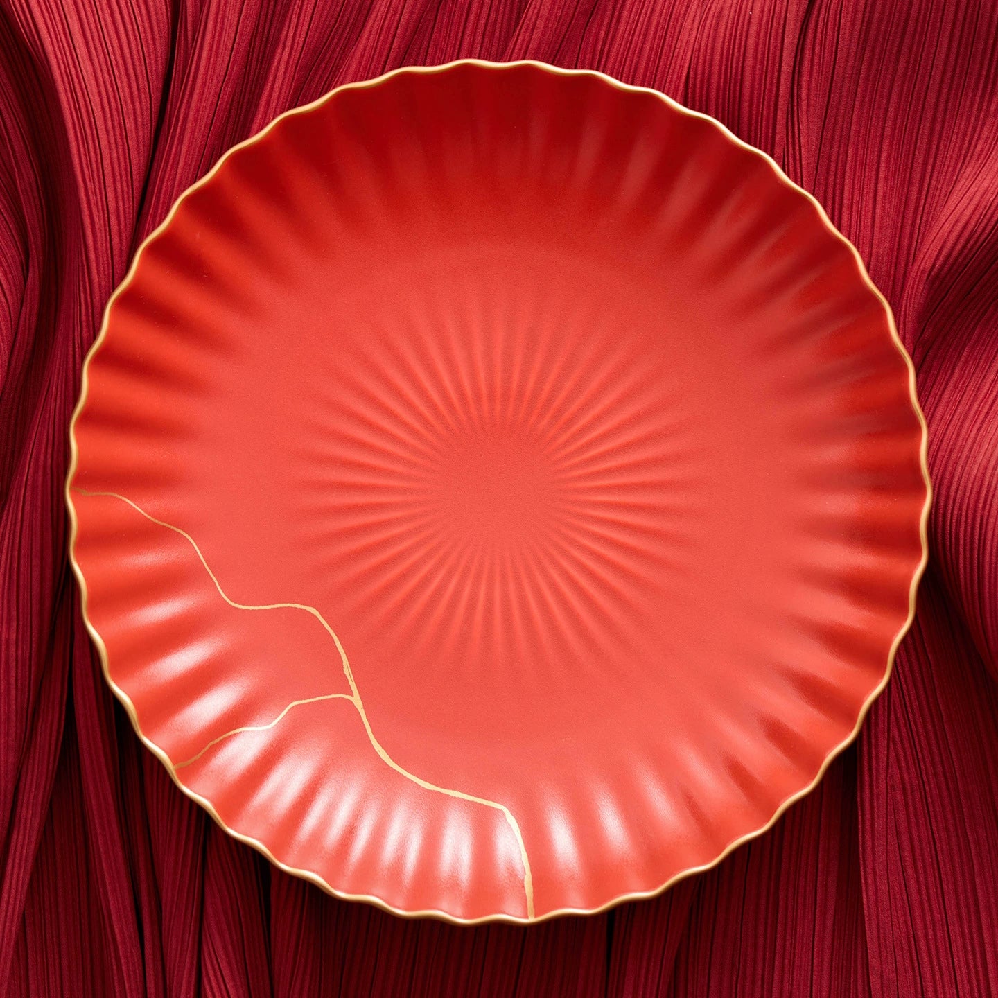 Elegant red ceramic serving bowl for salads and pasta