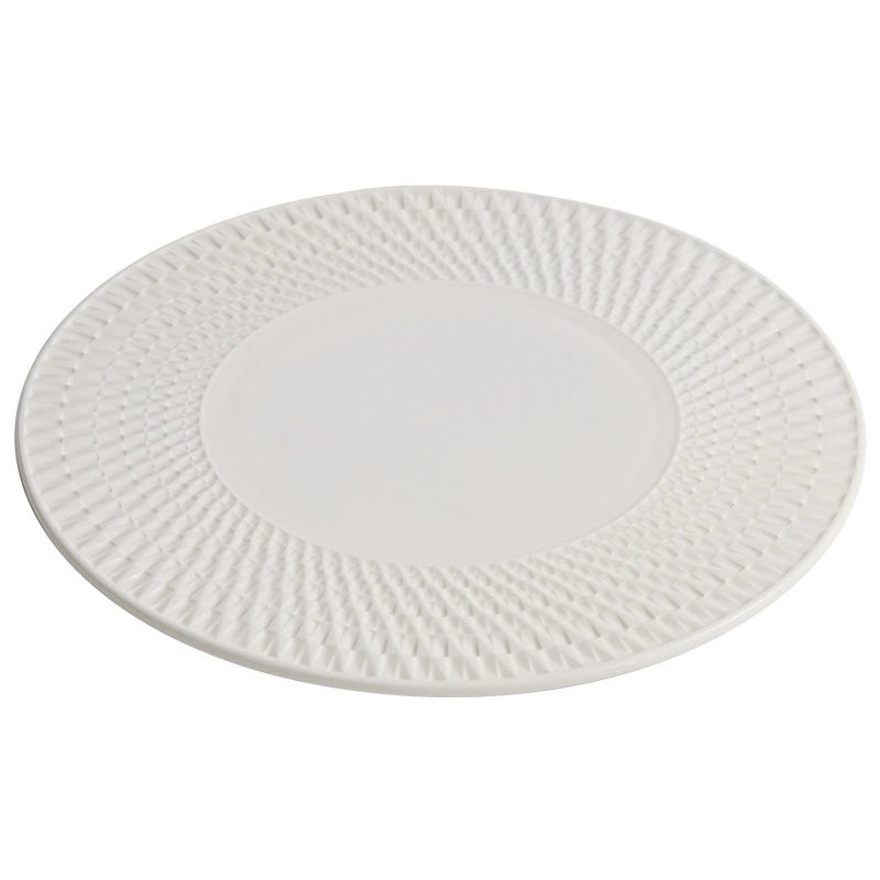 Elegant white ceramic dinnerware with spiral pattern rim