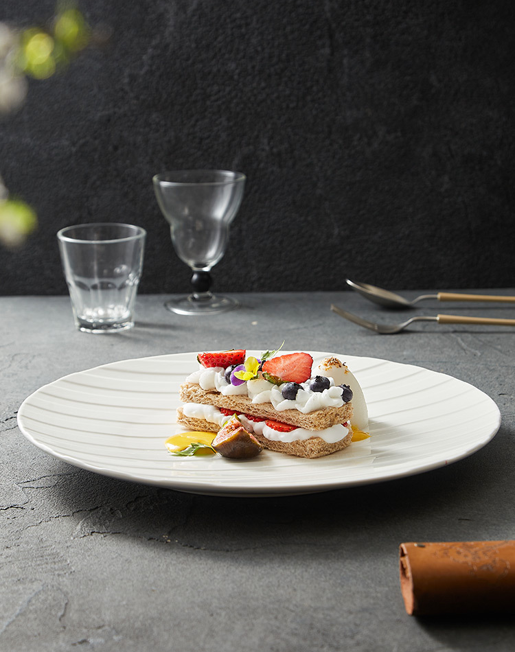 Elegant white textured ceramic dish for home and hotel dining