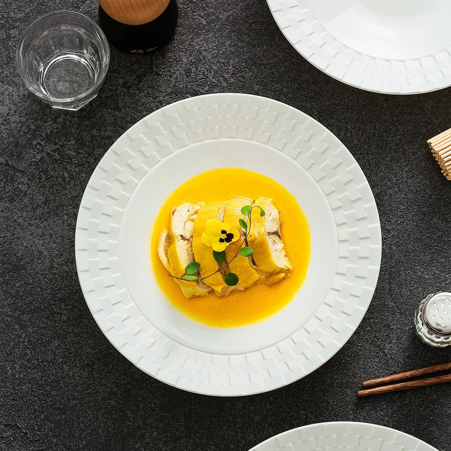 Embossed weave-texture shallow ceramic plate for fine dining presentation