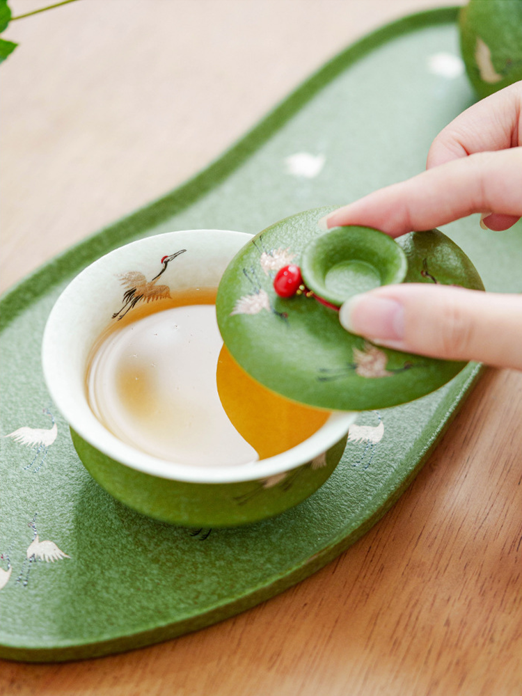 Fine Porcelain Tea Bowl with Red Bead Accent