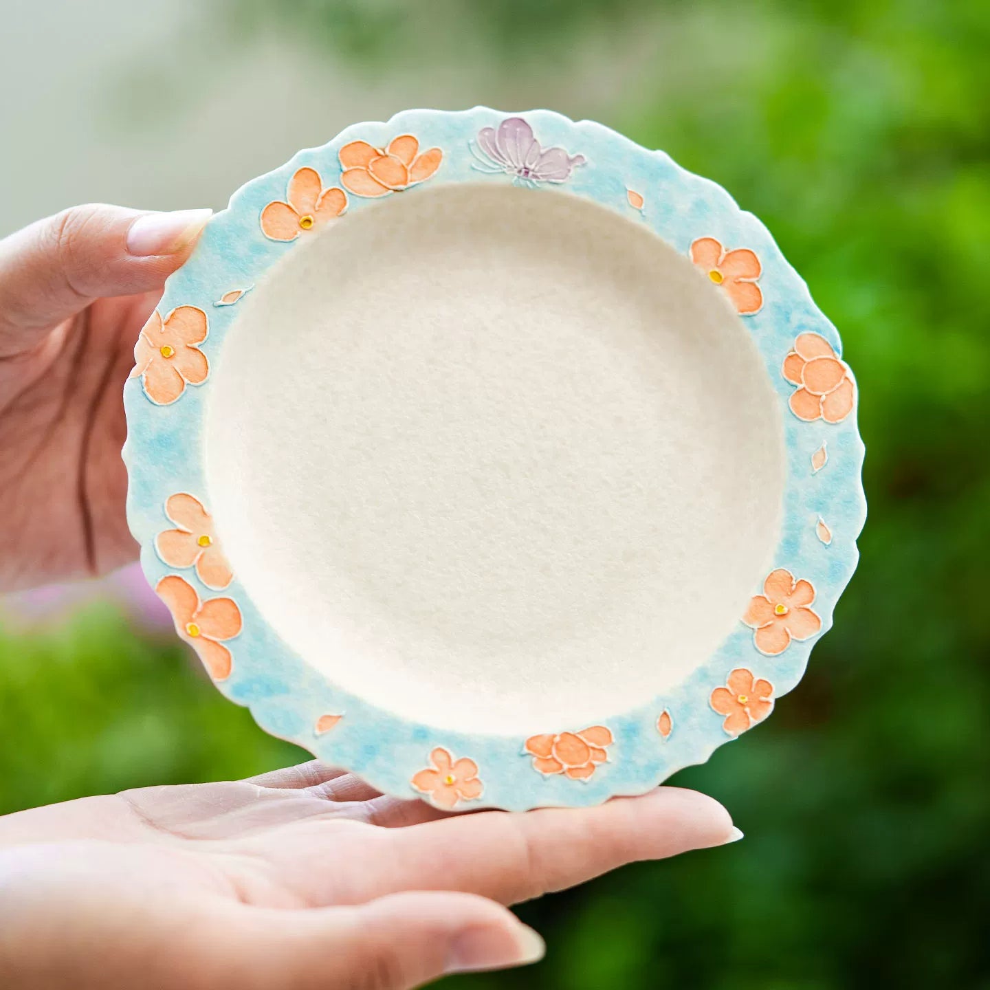 Floral embossed ceramic shallow dish