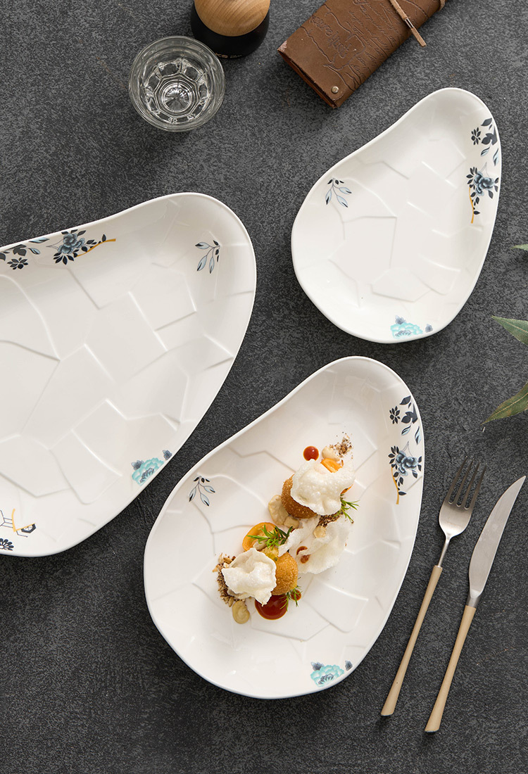 Flowform porcelain collection inspired by movement and texture.