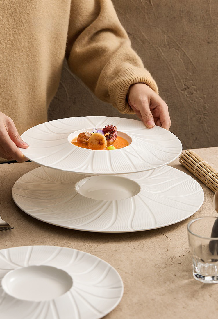 GOSEUNG tableware featuring radial relief petal texture.