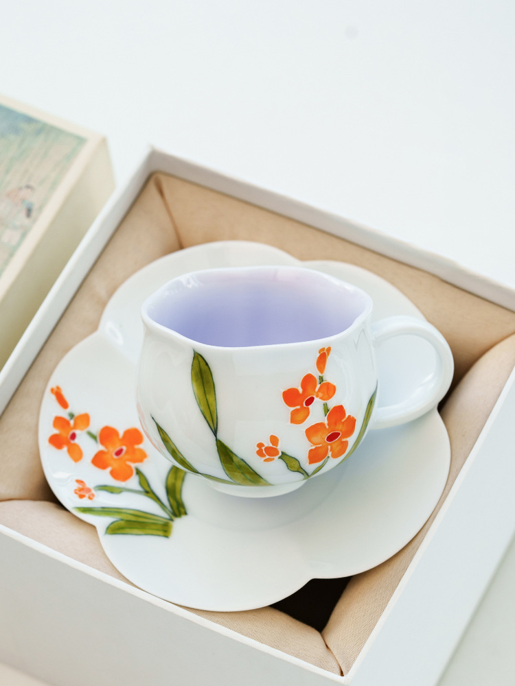 Gift box porcelain tea set with orange flower motif
