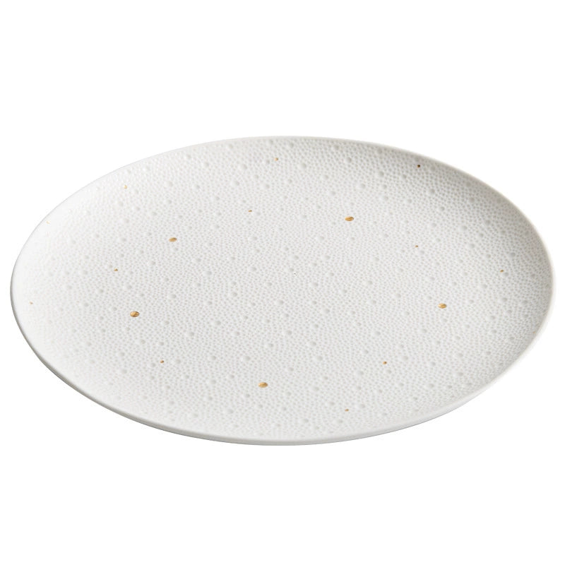 Gold-dotted ceramic plate for luxury table setting