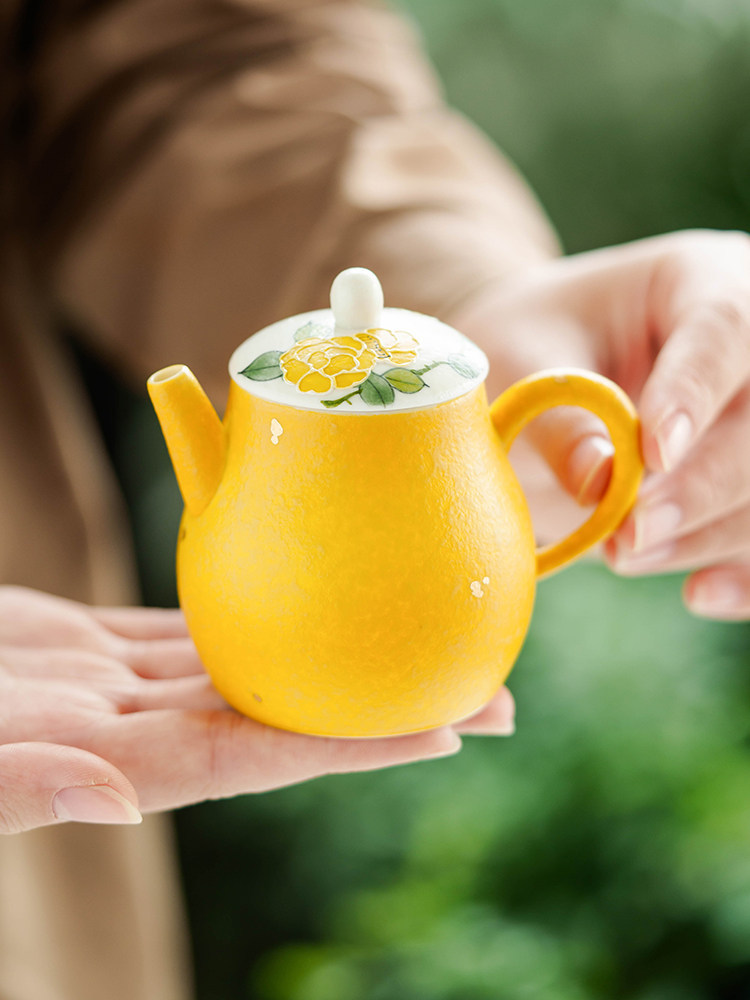 Goseung Heritage Collection teapot presented with its panoramic riverside pavilion gift box.